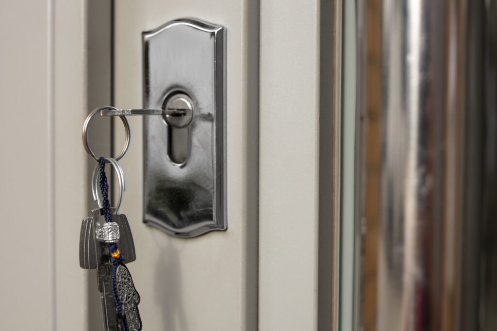 closed door with keys hanging